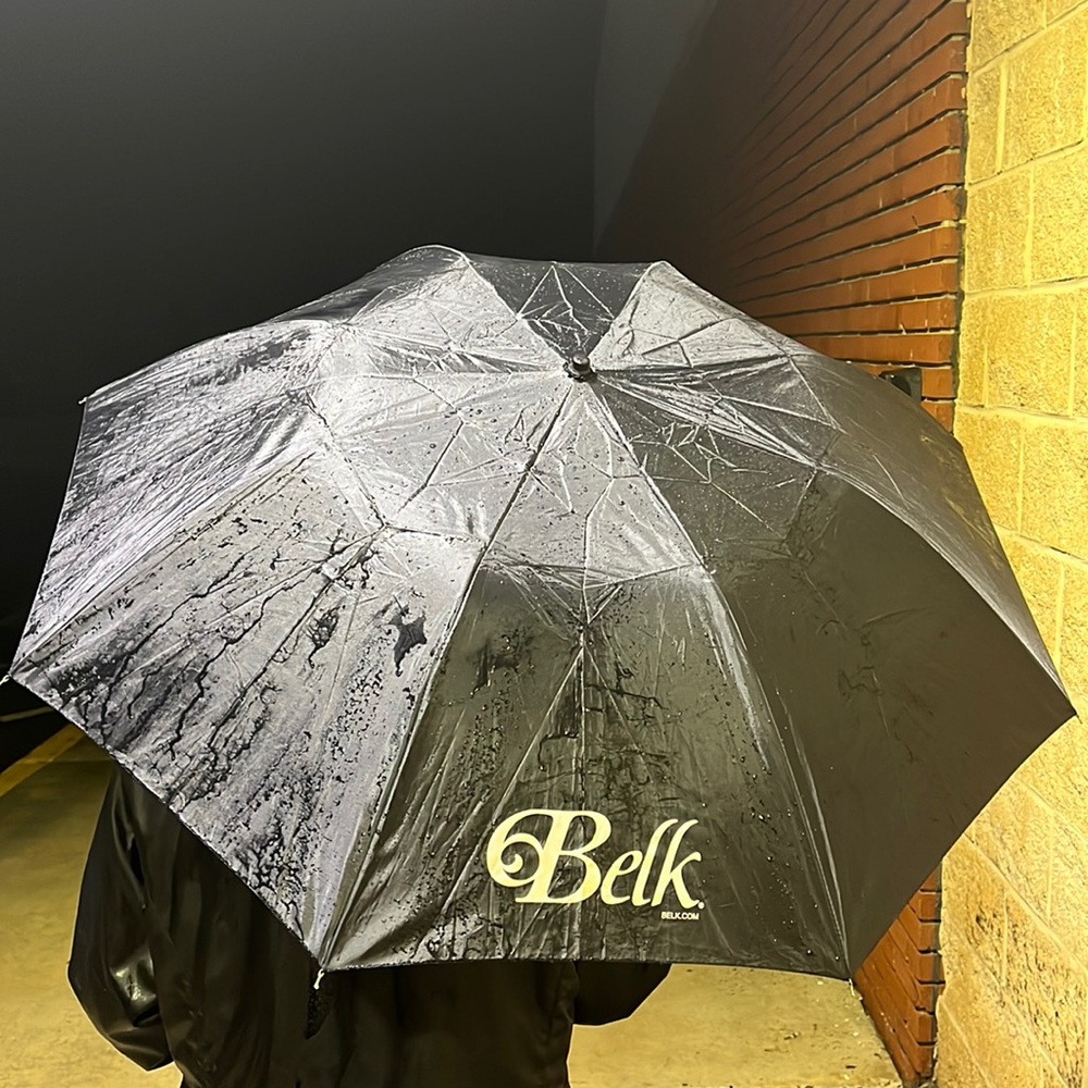 mini umbrella. Perfect condition, only used twice and got the job done each time